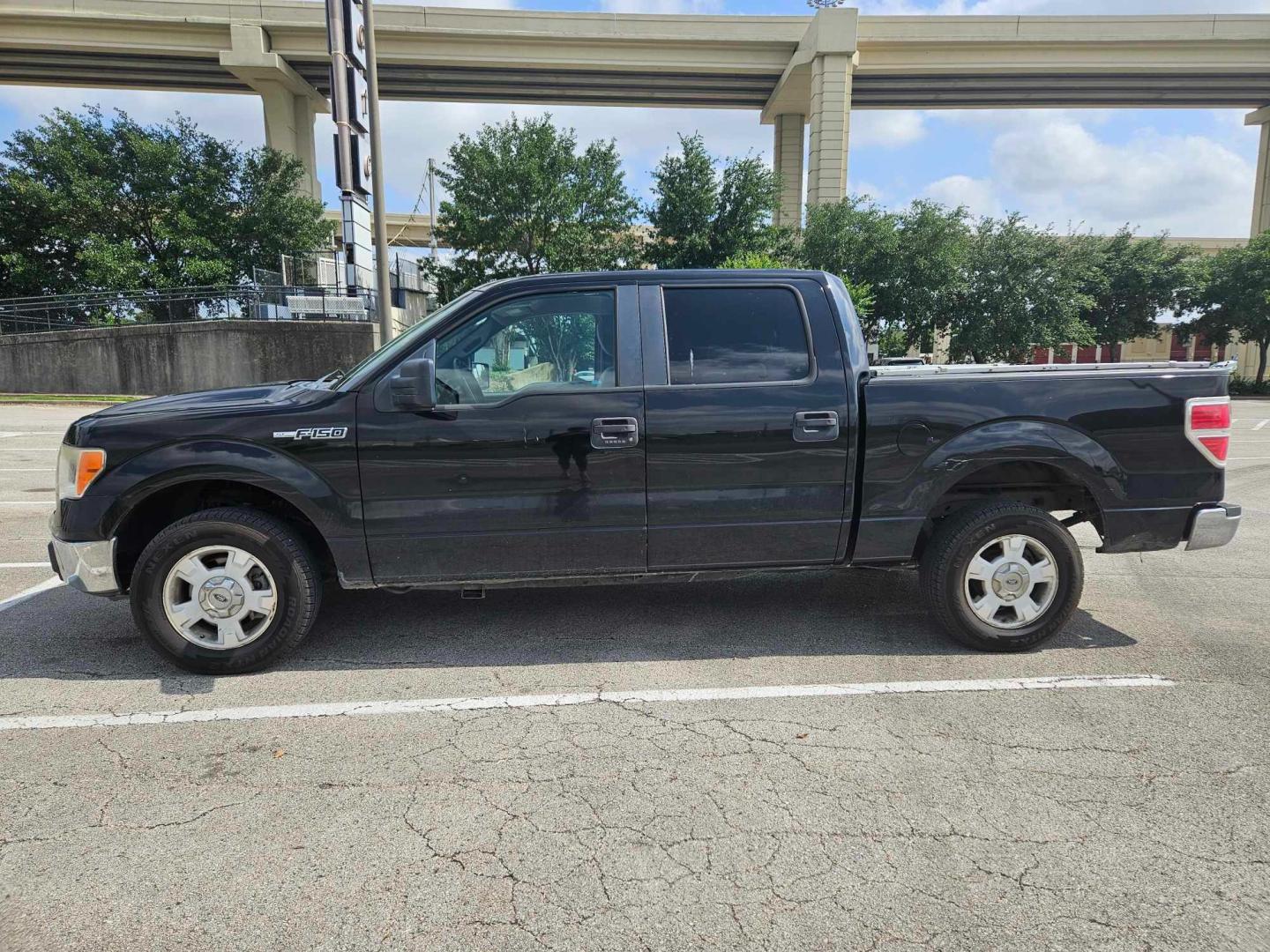 2009 Black Ford F-150 (1FTRW12829F) , located at 5005 Telephone Rd., Houston, TX, 77087, (713) 641-0980, 29.690666, -95.298683 - Photo#2